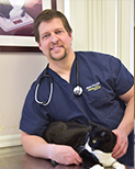 Dr. Brian Orr developed a passion for science which led him to graduate from The Pennsylvania State University with honors male doctor with a cat