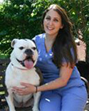 Dr. Manson attended Manor College where she graduated with a degree in veterinary technology and became a licensed veterinary technician. woman and a dog